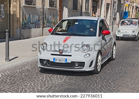 FORLI\', ITALY - JUNE 8: unidentified crew on a small sports car Fiat 500 Abarth during the rally \