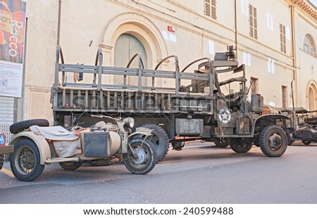 FAENZA, ITALY - NOVEMBER 2: old American truck World War II era armed with a machine gun, at the military vehicle rally during the festival \