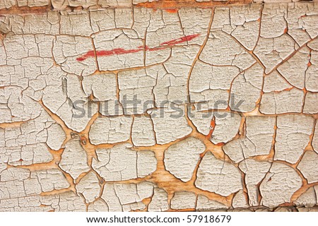 old wall of wood with peeling paint - dirty grunge texture