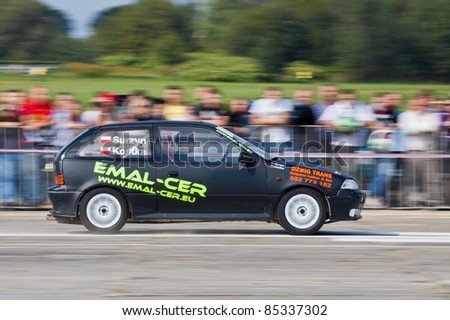KATOWICE, POLAND- SEPTEMBER 24: Suzuki Swift in action at Mobil1 Summer Cars Party 2011 RACE & MUSIC on September 24, 2011 in Katowice, Silesia, Poland.