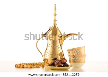 Similar – Image, Stock Photo Dates, teapot, cup with tea near the fire in the desert with a beautiful background