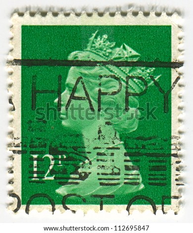 UK-CIRCA 1960:A stamp printed in UK shows image of Elizabeth II is the constitutional monarch of 16 sovereign states known as the Commonwealth realms, in green, circa 1960.