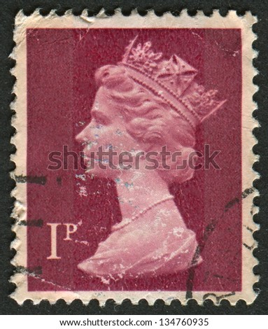 UK-CIRCA 1996:A stamp printed in UK shows image of Elizabeth II is the constitutional monarch of 16 sovereign states known as the Commonwealth realms,  in brown, circa 1996.