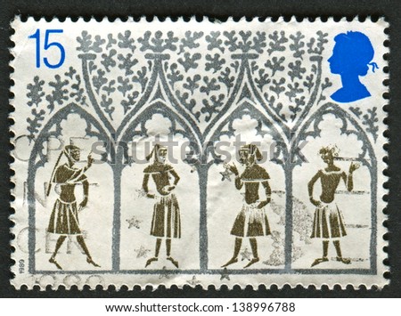UK - CIRCA 1989: A stamp printed in UK shows image of the 14th-century Peasants from stained-glass window. 800th Anniversary of Ely Cathedral , circa 1989.