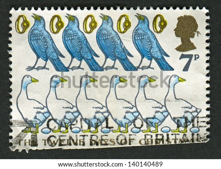 UK - CIRCA 1977: A stamp printed in UK shows image of the Six Geese a laying, Five Gold Rings, Four Colly Birds, circa 1977.