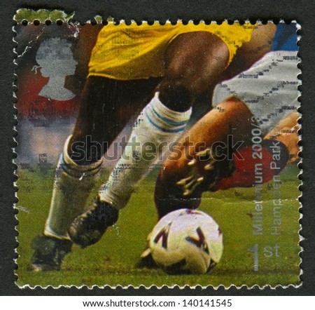 UK - CIRCA 2000: A stamp printed in UK shows image of the Football Players (Hampden Park, Glasgow), circa 2000.