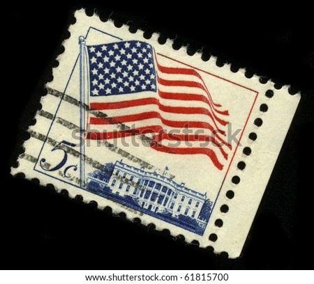 USA - CIRCA 1960: A stamp rotated forty-five degrees and  printed in USA shows image of the dedicated to the American Flag circa 1960.