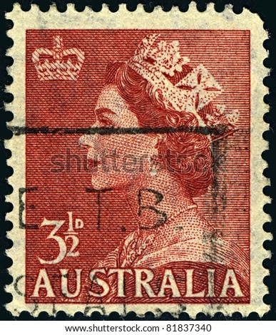 AUSTRALIA-CIRCA 1953:A stamp printed in AUSTRALIA shows image of Elizabeth II (Elizabeth Alexandra Mary, born April 21, 1926) is the constitutional monarch of United Kingdom in brown, circa 1953.