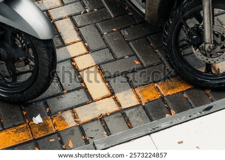 Similar – Image, Stock Photo Two asphalt parking spaces in front of a colourful concrete wall and the shadow of a railing
