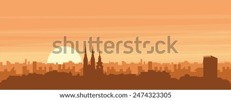 Brown panoramic poster of the city skyline with misty background buildings, sunrise, clouds and mountains of ZAGREB, CROATIA