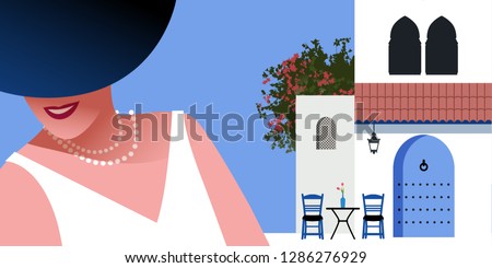 Woman with blue hat and pearls necklace, on background of typical morocco style mediterranean village. Blue door under a roof, Moorish windows, chairs and a small table with vase. Bougainvillea