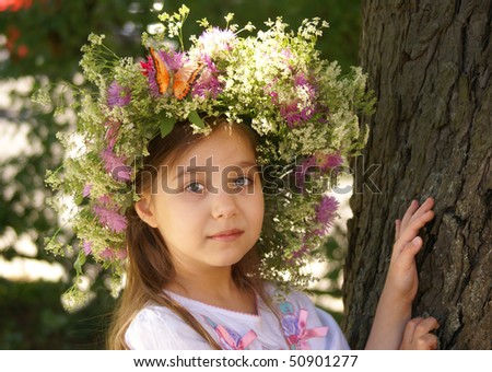 Portrait of a beautiful girl  with flower diadem
