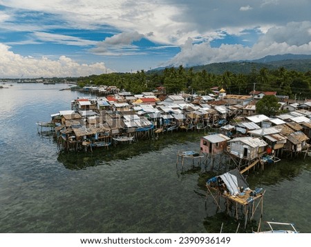 Similar – Foto Bild Haus auf Stelzen am See in der Nähe der Berge