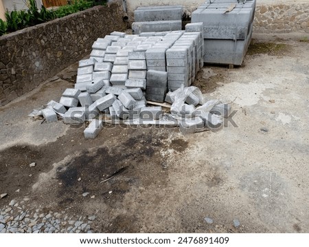 Similar – Image, Stock Photo Loose concrete paving stones in heaps