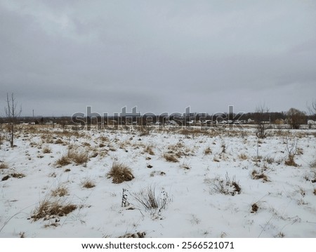 Similar – Image, Stock Photo Spacious field with dry grass and hills behind