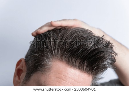 Similar – Image, Stock Photo Close-up of man hands kneading bread dough on a cutting board