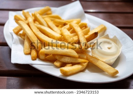 Similar – Foto Bild Belgische Pommes frites mit Sauce Andalouse