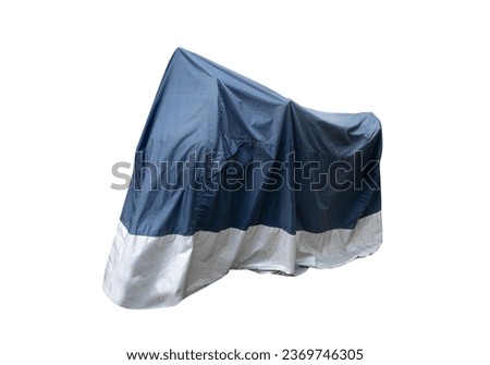 Image, Stock Photo Waterproof cover for motorcycle with silver reflective protective surface. Motorcycle covered with fabric shield and parked outside