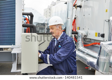 Portrait of senior adult smiling ventilaation electrician builder engineer