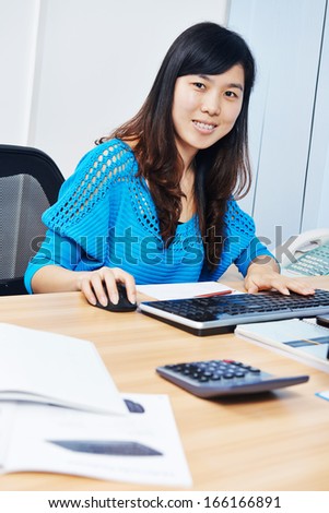 chinese office manager woman at work place