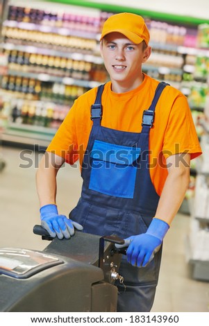 Floor care and cleaning services with washing machine in supermarket shop store
