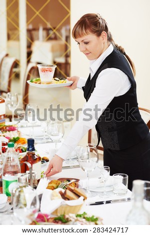 Similar – Image, Stock Photo Served banquet table with elegant decorations and plates with cutlery