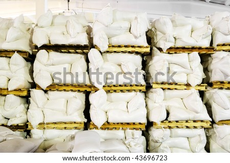 storehouse with stacked sacks of meal