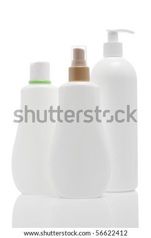 set of white isolated plastic bottles with spray and proportioner for cosmetics