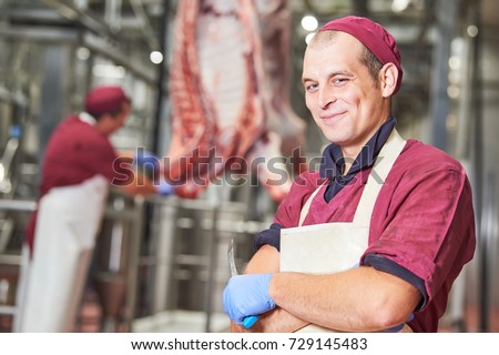meat manufacturing factory. Portrait of young butcher Сток-фото © 