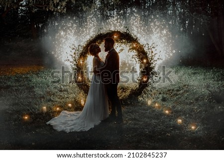 The bride and groom. The night by the light of fireworks. Сток-фото © 