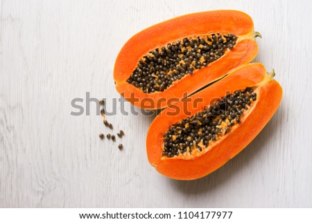 Similar – Foto Bild Halbierte Papaya auf blauem Hintergrund. Platz zum Kopieren.