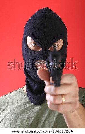 A man with a black mask, burglar
