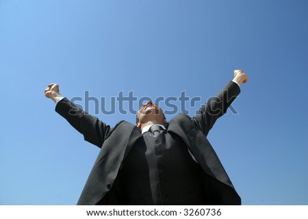 Sucess business man with arms wide open