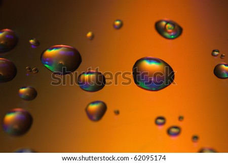 beautiful and colorful drops on cd, technology photo