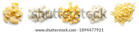 Set of cheese pieces - parmesan, mozzarella, diced, grated and soft cheese isolated on white background, top view