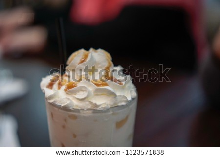 Similar – Image, Stock Photo Salted caramel frappe coffee served on glass