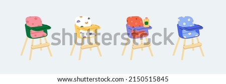 Similar – Image, Stock Photo Baby seated in high chair reaching for spoon; dramatic natural lighting and messy tray table