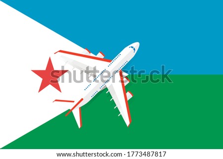 Vector Illustration of a passenger plane flying over the flag of Djibouti. Concept of tourism and travel