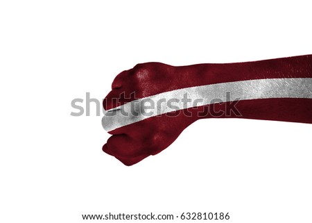 Fist painted in color Latvia flag, hand isolated on white background. Stock fotó © 