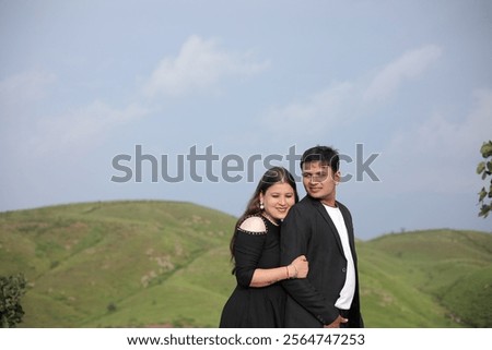 Similar – Image, Stock Photo Happy girlfriends embracing against canyon and ridge during trip