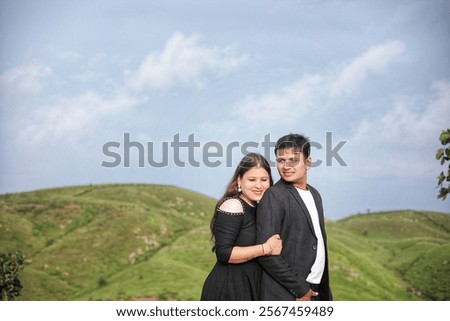 Similar – Image, Stock Photo Happy girlfriends embracing against canyon and ridge during trip