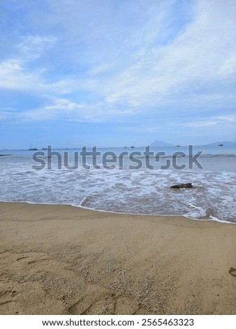 Similar – Image, Stock Photo Foamy waves of sea splashing on rocky shore in sunlight