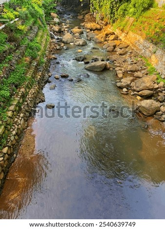 Similar – Foto Bild Größe Felsen im Wasser, Ostsee mit Wolken am Horizont