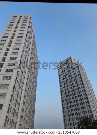 Similar – Foto Bild Verlassenes Gebäude gegen sauberen Himmel. Sowjetische modernistische Architektur, notleidende Betonhaus