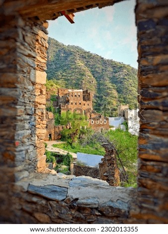 Hiking and touring the southern parts of Saudi Arabia.  Those castles are in an area called Al-souda . It was a very beautiful and historical rich place and the people kept the heritage well Stok fotoğraf © 