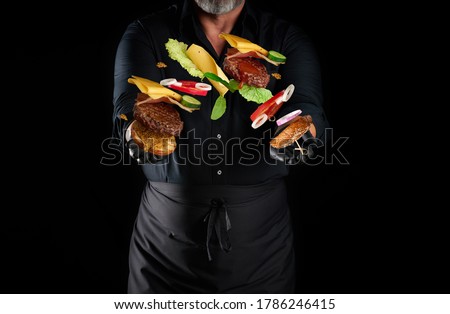 Similar – Image, Stock Photo Chef preparing burgers at grill plate on international urban street food festival.