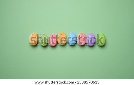 Similar – Image, Stock Photo multicolored decorative Easter eggs decorated with sequins on a green background