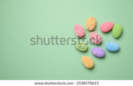 Similar – Image, Stock Photo multicolored decorative Easter eggs decorated with sequins on a green background