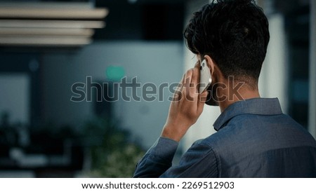 Similar – Image, Stock Photo Back of a client in a barber shop sitting in a chair and cutting his hair