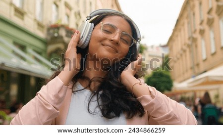 Similar – Foto Bild Frau mit Kopfhörern Musik